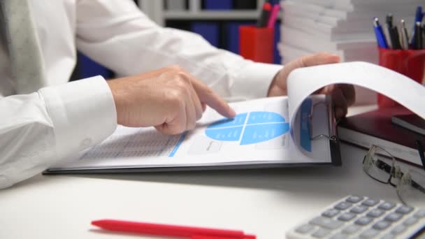 Businessman Working Calculating Reads Writes Reports Office Employee Table Closeup — Stock Video