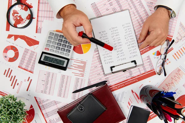 Flat top view of businessman working and calculating finance, re — Stock Photo, Image