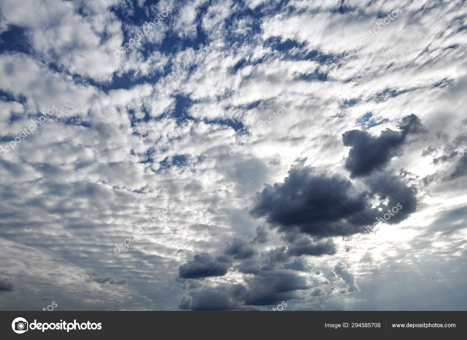 Dark Blue Sky With Clouds For Background Or Texture Stock Photo