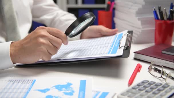 Businessman Working Calculating Reads Writes Reports Office Employee Table Closeup — Stock Video