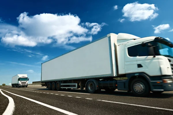 White truck is on highway - business, commercial, cargo transportation concept — Stock Photo, Image