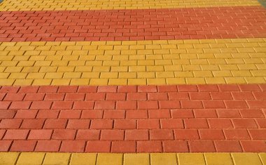 arkaplan veya doku için sarı ve kırmızı kahverengi döşeme taşı