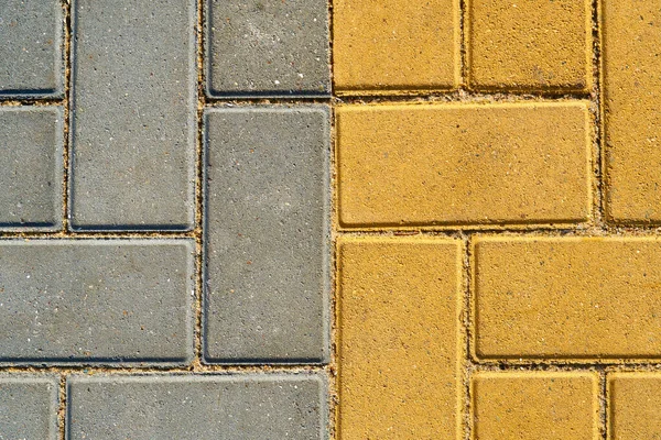 Yellow and grey paving tile for background or texture — Stock Photo, Image