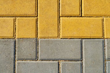 arkaplan veya doku için sarı ve gri döşeme taşı