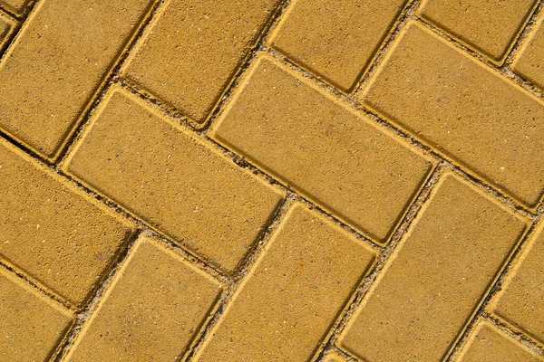 Yellow paving tile for background or texture — Stock Photo, Image