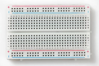 circuit mounting plate closeup for mounting electronic component, unit, part, radio equipment and digital microchip - DIY kit for learning, training and development of electric circuits