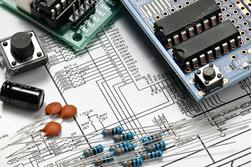 closeup of electronic components, printed circuit board, unit, part, circuit diagram, computer equipment and digital microchip - DIY kit for learning, training and development of electric circuits