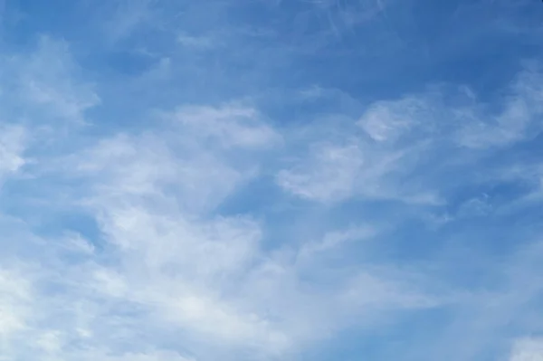 Blue sky background with white clouds — Stock Photo, Image