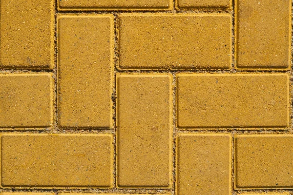 Baldosas de pavimentación amarillas para fondo o textura —  Fotos de Stock