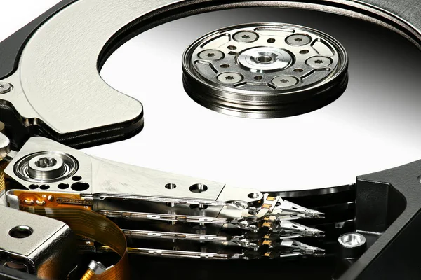 Disassembled computer hard disk drive, hdd with mirror effect. Macro photo. Opened hard drive, magnetic heads and disk plates — Stock Photo, Image