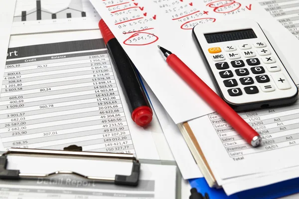 stock image Top view of office worker's desk - work with financial reports, analysis and accounting, tables and graphs, various office items for bookkeeping