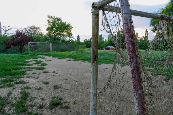 Abandoned Football Field Goal Torn Net Vacant Lot — Stock Photo, Image