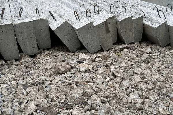 new concrete blocks and curbs for road construction