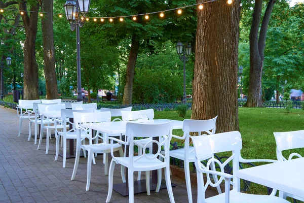 Open Air Street Cafe Outdoor White Chairs Tables Decorated Illumination — Stock Photo, Image