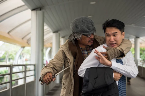 Shocked Businessman Hostage Threaten Knife Homeless Old Beggar Robber Man — Stock fotografie