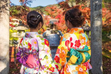 Japanese women at Eikando in autumn, Kyoto clipart