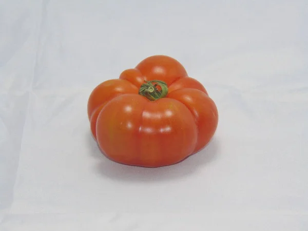 Weird fresh and red tomato.