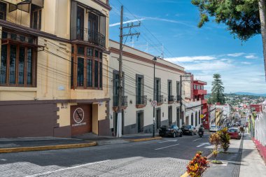 XALAPA, VERACRUZ, MEXICO- AUGUST 1, 2025: Street view with antique buildings at a sunny day in Xalapa, Veracruz, Mexico