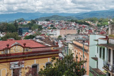 XALAPA, VERACRUZ, MEXICO- AUGUST 1, 2025: Panoramic view of Xalapa city from Parque Juarez at a sunny day
