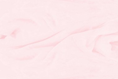 Güzel pembe kumaş dokusu arkaplanının yakın çekimi.