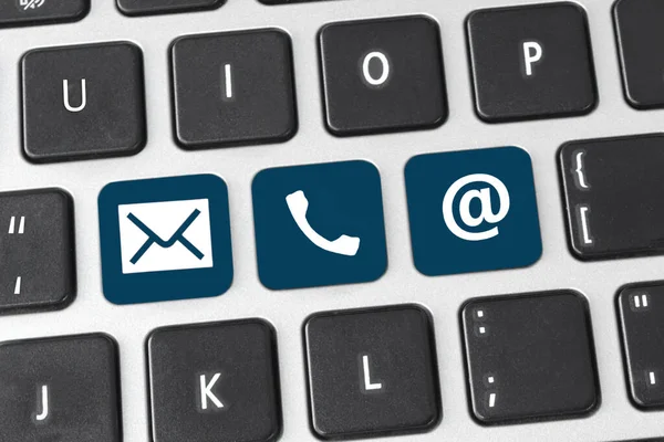 Contact us\' button on keyboard. Concept of internet online contact through website.