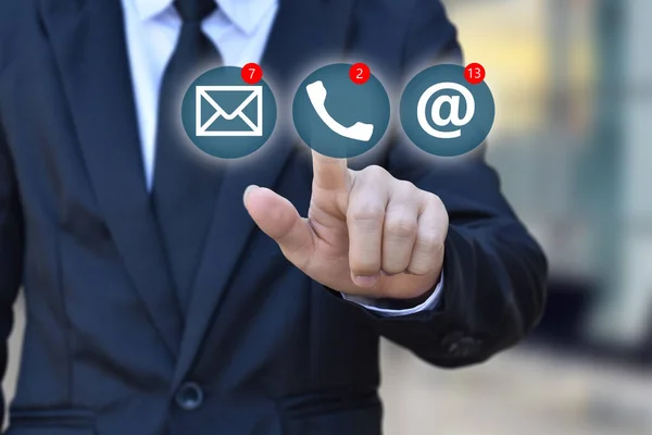 Businessman choosing virtual contact icon. CONTACT US (Customer Support Hotline people connect )