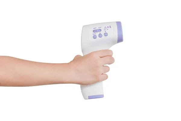 Hand holding digital infrared thermometer (thermometer gun) Isolated on white background with clipping path. For check forehead temperature measurement scan.