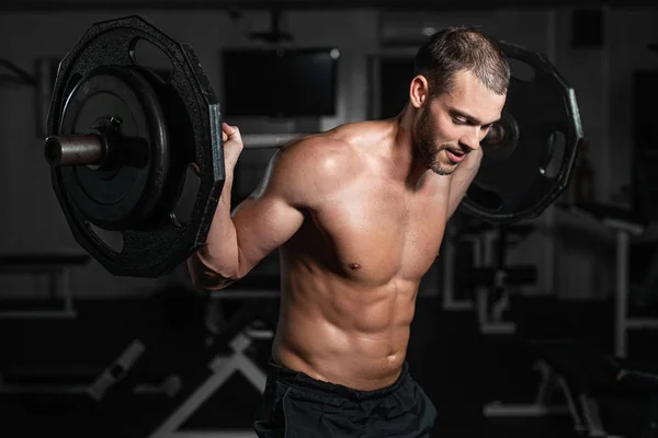 Stilig Tyngdlyftare Lyfta Skivstänger Med Knäböj Manliga Träning Med Skivstång — Stockfoto