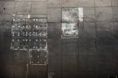 Eski paslı siyah metalik yüzey bir doku, denizaltı gövdesi olarak kullanmak için