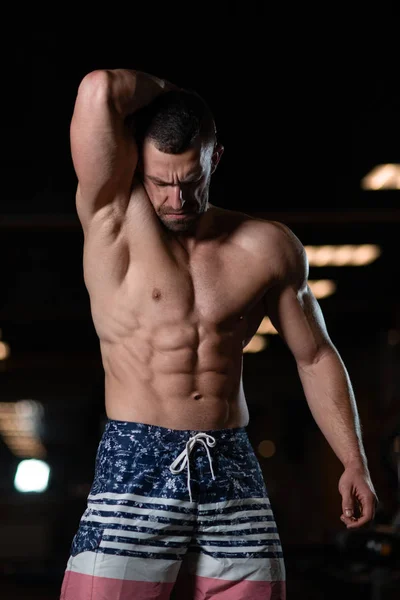 Acımasız bir atletik adam ile bir kas vücut kasları gösterilen spor salonunda teşkil etmektedir. Sağlıklı bir yaşam tarzı kavramı