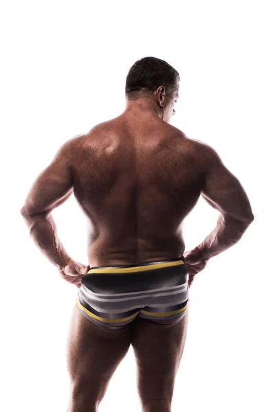 Gran Hombre Poderoso Muestra Espalda Estudio Sin Una Camisa Sobre —  Fotos de Stock