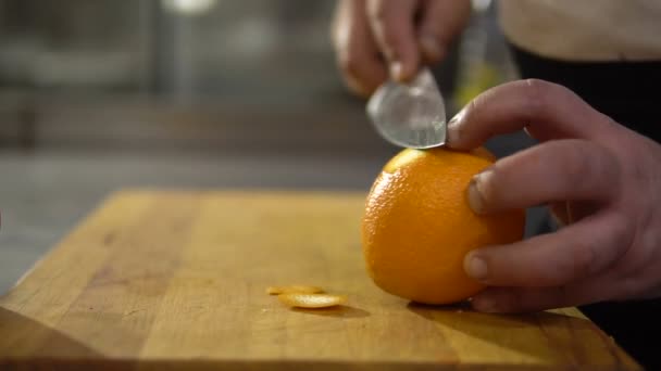 Cook Cleans Orange Close Hands Knife Cut Peel Fruit — Stock Video