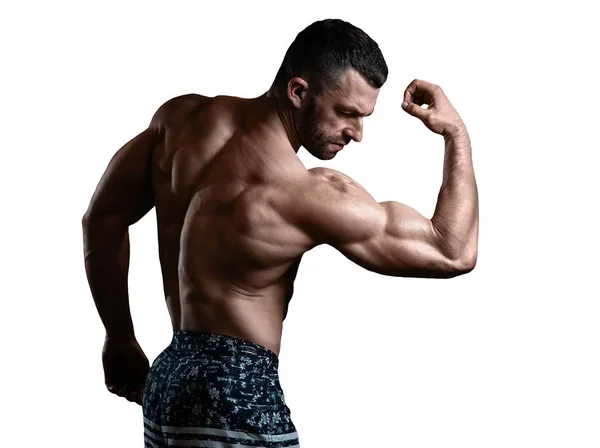 Ein Vereinzelter Brutaler Athletischer Mann Mit Muskulösem Körper Posiert Und — Stockfoto