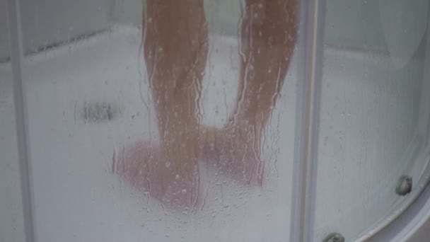 Teen girl bathing under shower — Stock Video © VaLiza #224687076