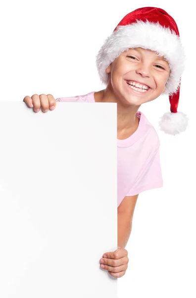 Junge mit Weihnachtsmütze — Stockfoto