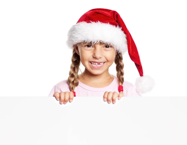 Happy little girl in Santa hat — Stock Photo, Image