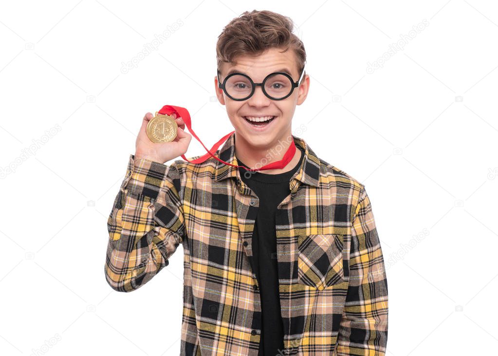 Teen boy with medal