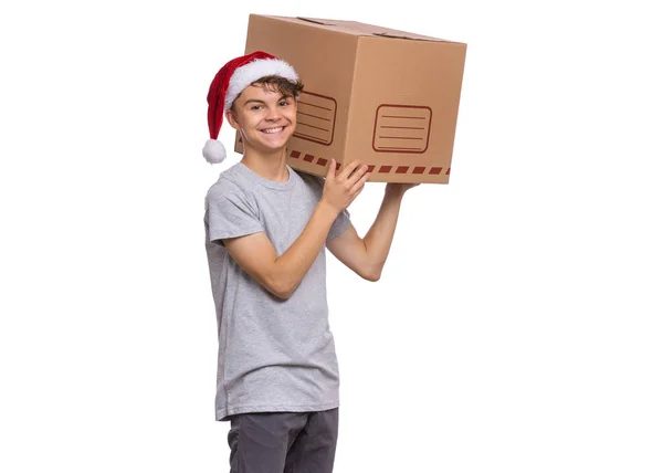 Vánoční boy v santa čepice — Stock fotografie