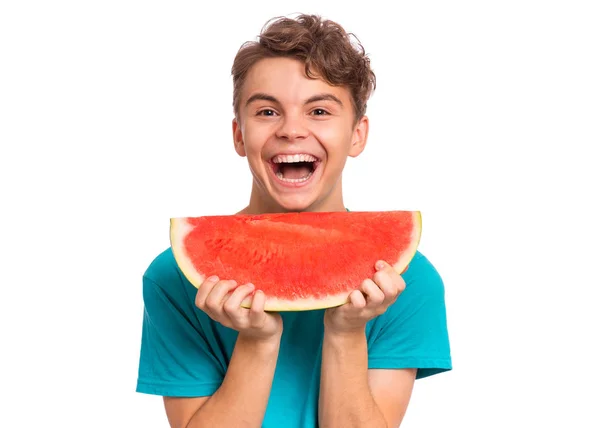 Tiener jongen eten watermeloen — Stockfoto