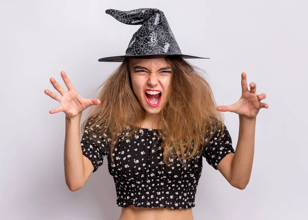 Menina adolescente em chapéu preto bruxa — Fotografia de Stock