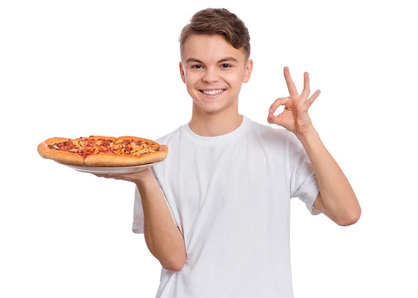 Tiener jongen met pizza — Stockfoto