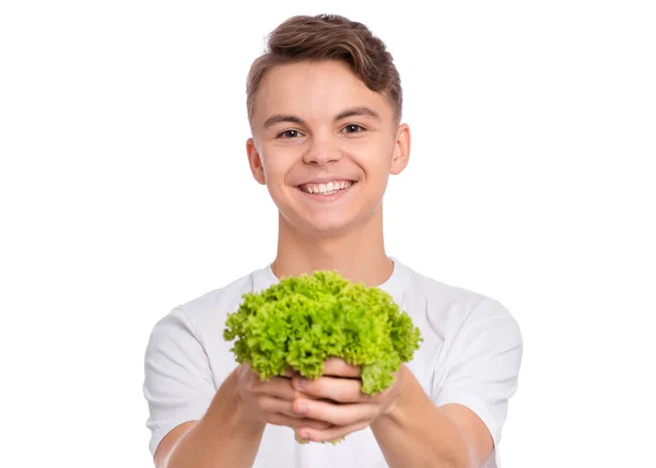 Tiener jongen met groenten — Stockfoto