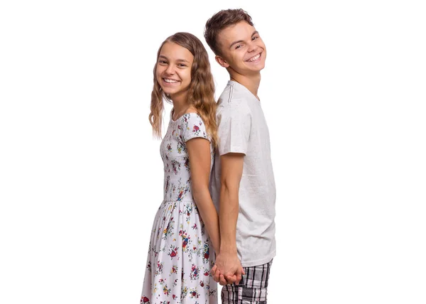 Adolescente menino e menina no branco — Fotografia de Stock