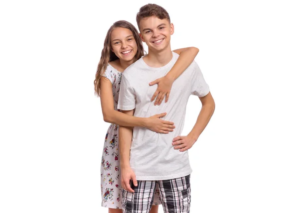 Adolescente menino e menina no branco — Fotografia de Stock