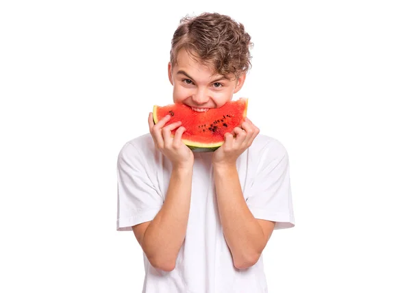 Adolescente menino comer melancia — Fotografia de Stock