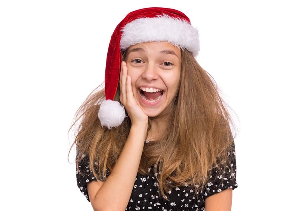 Joyeux adolescent fille avec chapeau santa rouge — Photo