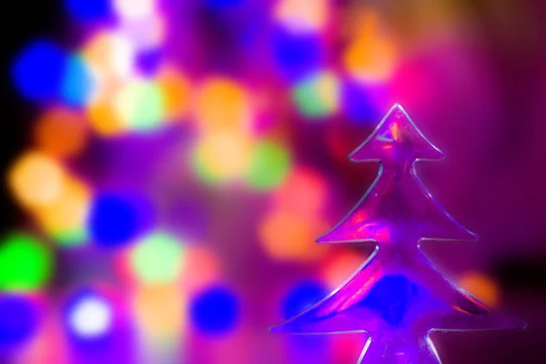 Árbol Navidad Luces Borrosas Abstractas Fondo Azul Púrpura Colores Naranjas —  Fotos de Stock