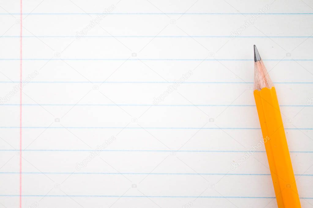 Back to school, education concept - orange pencils close up and composition book on background for educational new academic year begin or study term start. Mock-up Copy space