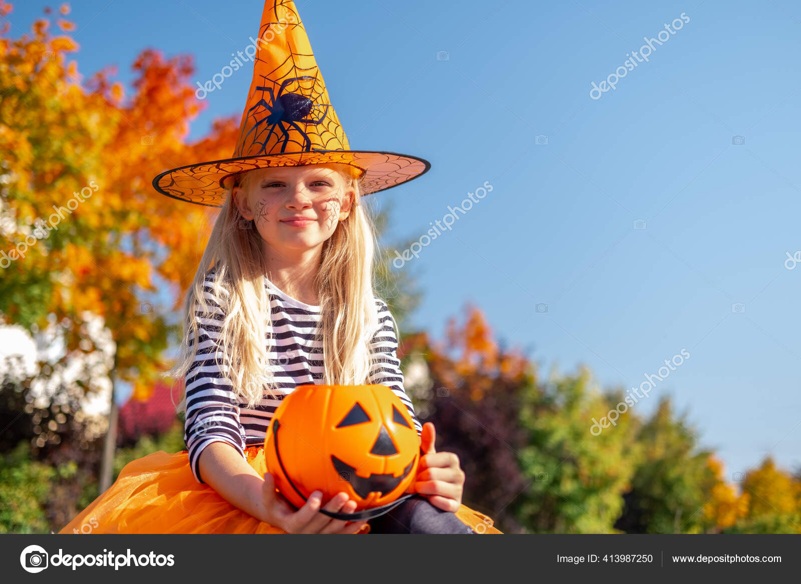 Halloween Kids Portrait Smiling Girl In Witch Hat With Pumpkin Candy Bucket Funny Kids In Carnival Costumes Outdoors Stock Photo Image By C Kuzinanatali 413987250