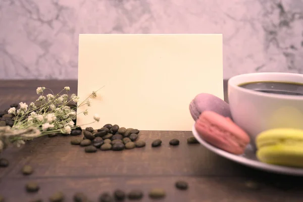 message card and roast coffee and black coffee for background